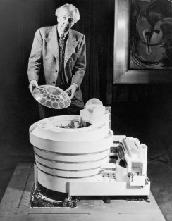 Frank Lloyd Wright with a model of the Guggenheim Museum, 1945