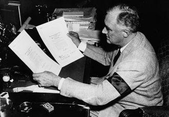President Franklin D Roosevelt signing a joint congressional declaration of war against Germany and Italy, at the White House, Washington DC, December 22nd 1941. (Photo by Keystone/Hulton Archive/Getty Images)